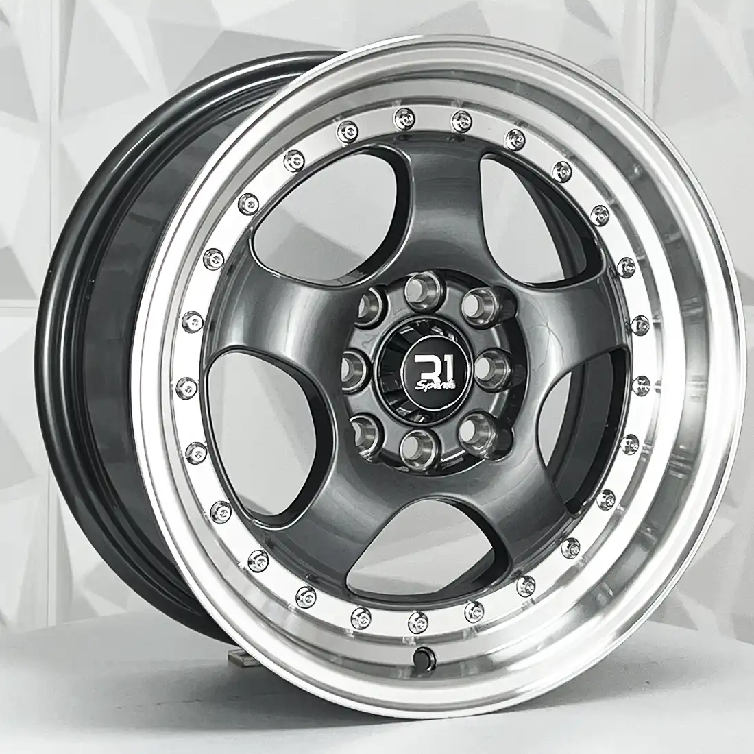 Rin 151201 F15X7 R15X8 4-100/114.3 1064 GUNMETAL MI CHROME RIVETS ET30/ 4-100 con barrenación 4-100