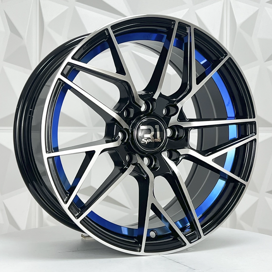 Rin 151576 RIN 15X7 4-100/114.3 R1 SPORT DX245 BLACK MACHINE FACE+BLUE 4-100 con barrenación 4-100