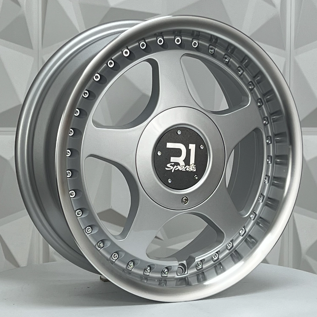 Rin 156751 F15X7 R15X8.5 4-100/114.3 HX085B SILVER MACHINE LIP CHROME R 4-100 con barrenación 4-100